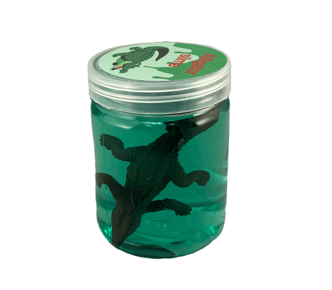 alligator and slime in jar