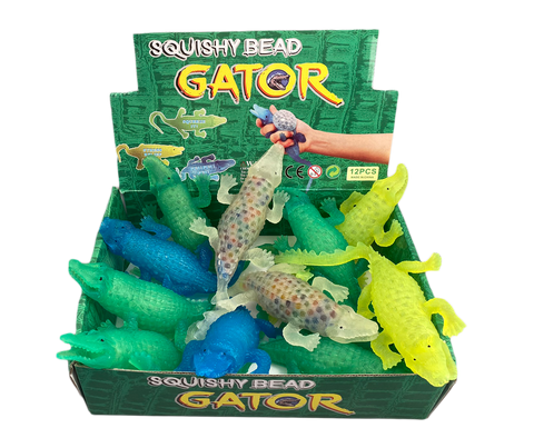 box of toy plastic alligators