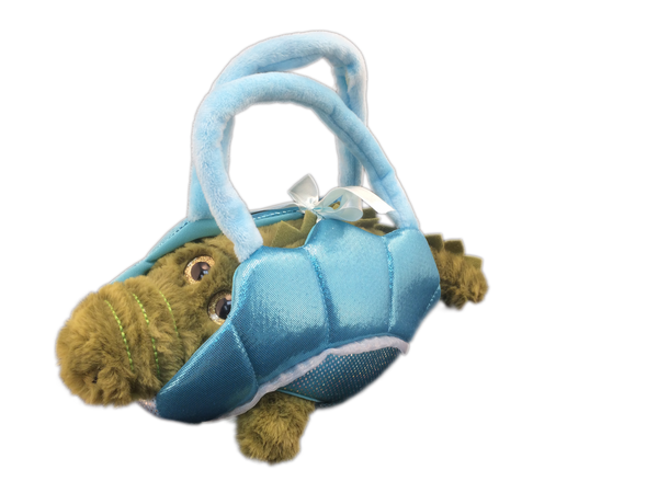 plush alligator toy in blue basket holder